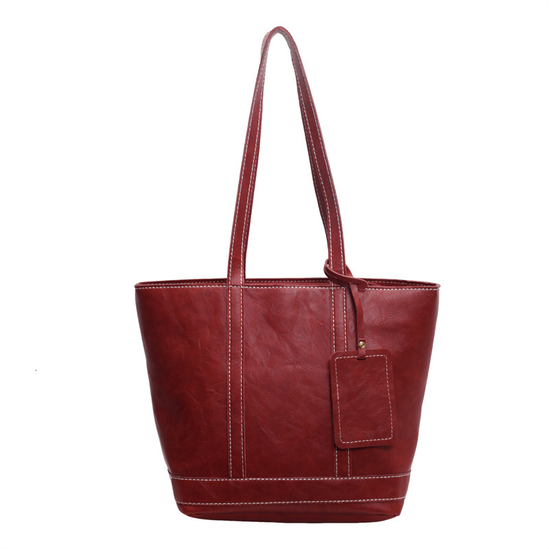 2025S Designer Women S Bag Fashionable Large Capacity Handbag For Work Shopping Commuting Simple Tote Bag Textured Casual One Shoulder Armpit Bag