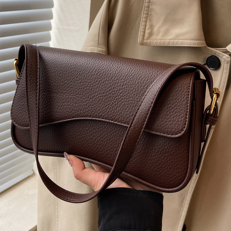 2025S Designer Women s Bag New Flip Fashion Simple Style Armpit Small Square Bag Mini Handbag High end Texture Crossbody Bag Outdoor Casual Handbag Sa