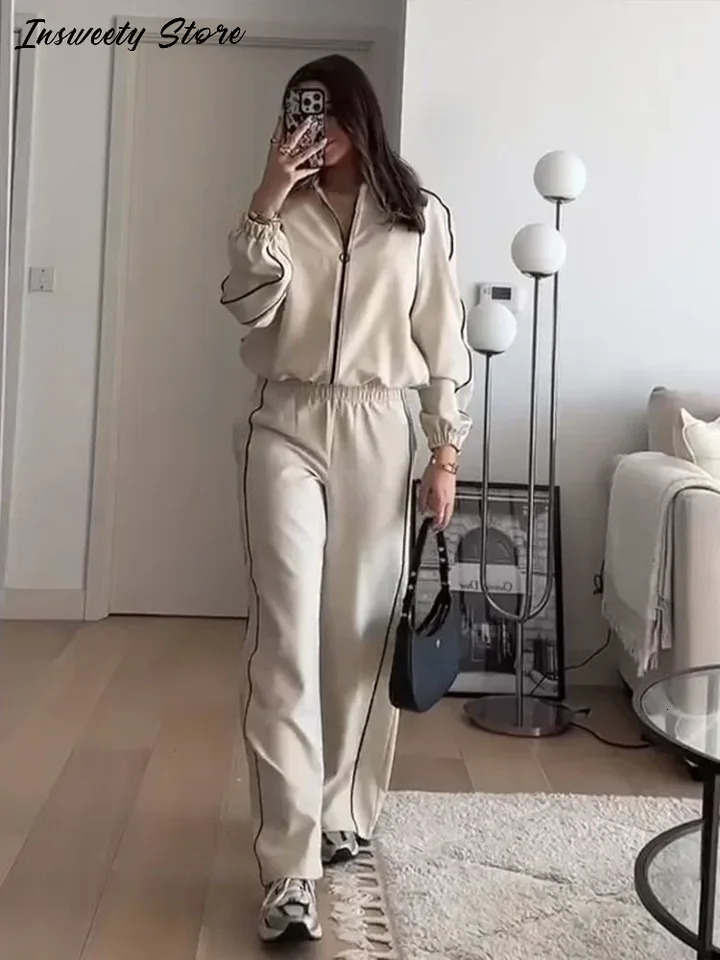 Striped sports jacket pants set womens loose full sleeved stand up collar top high waist wide leg pants spring womens track and field clothes 250402