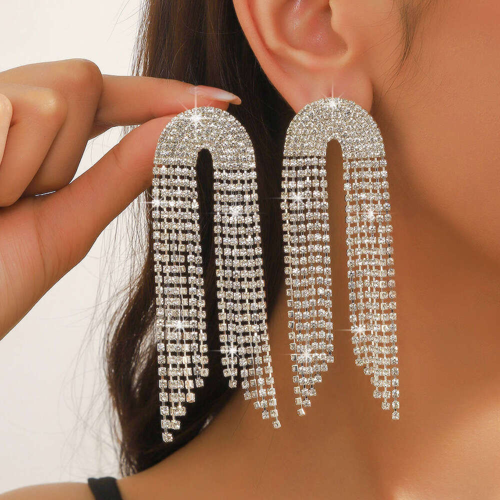 Hot selg with exaggerated high-end feel, light claw chain earrings, long rhie tassels, personalized girl earrings