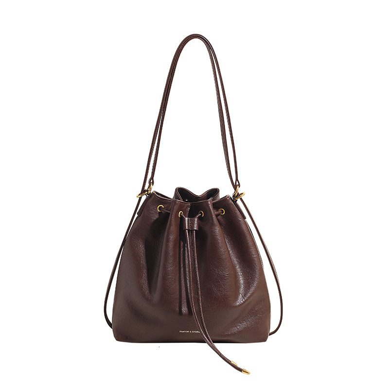 2025S Designer Women S Bag Korean Version Tote With High End Feel Large Capacity Bag For Women New Simple Bucket Bag Fashionable Backpack