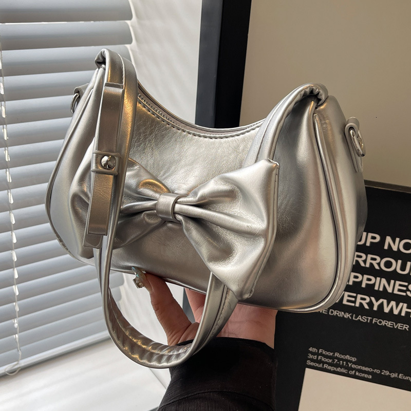 2025S Designer Women S Bag Texture Solid Color Bow Underarm Women S Summer New Item Niche Fashion Design Versatile Crossbody Shoulder Bag