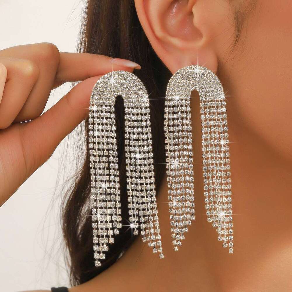Hot selg with exaggerated high-end feel, light claw chain earrings, long rhie tassels, personalized girl earrings