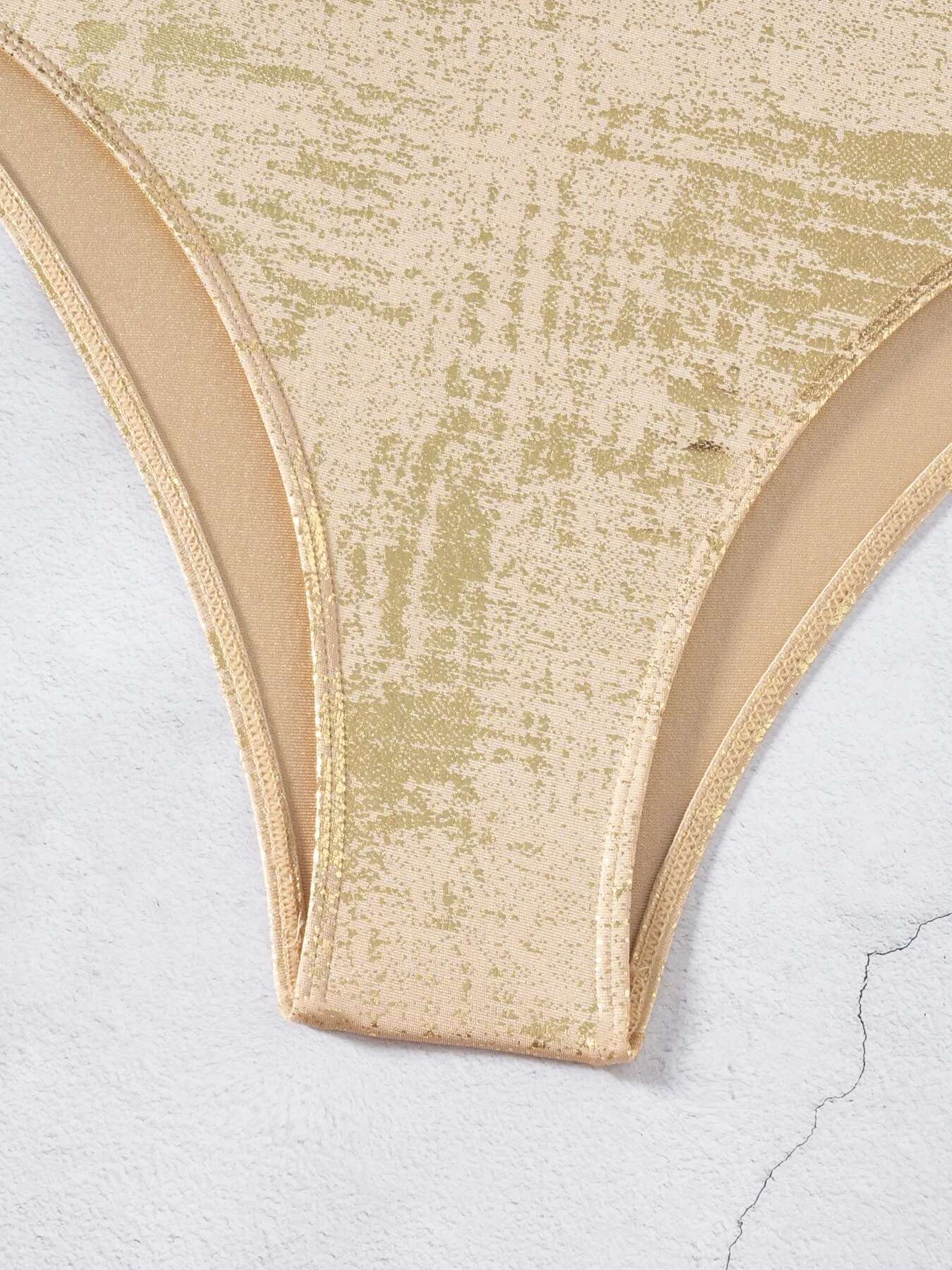 Dongdumaoyi Shiny Gold One Piece Swimsuit Women Deep V Neck Hollow Out Backless Swimwear Summer Beach Bathing Suit Holiday Monokini
