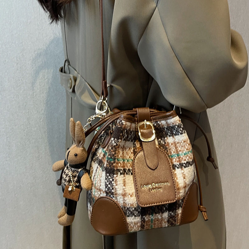 2025S Designer Women S Bag High End Color Blocked Crossbody Bucket Spring New Trendy Plaid Shoulder For Work Leisure Commuting Women S Bag