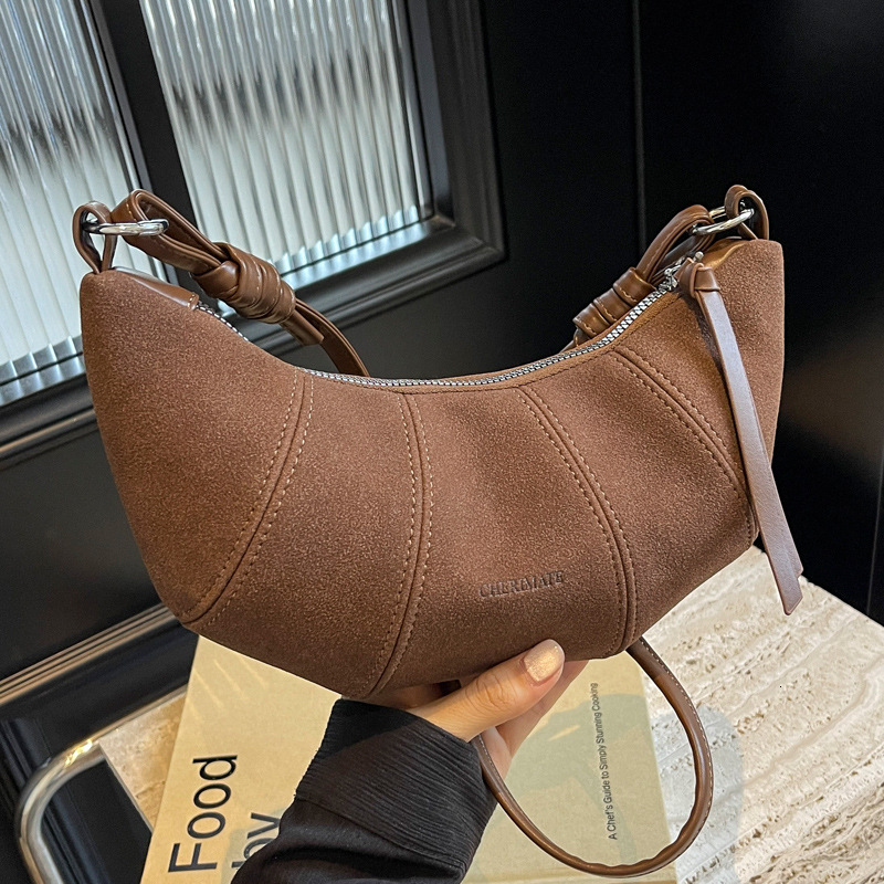 2025S Designer Women S Bag Autumn New Women S Versatile Light Luxury Simple Bull Horn Bag Fashion Single Shoulder Crossbody Bag