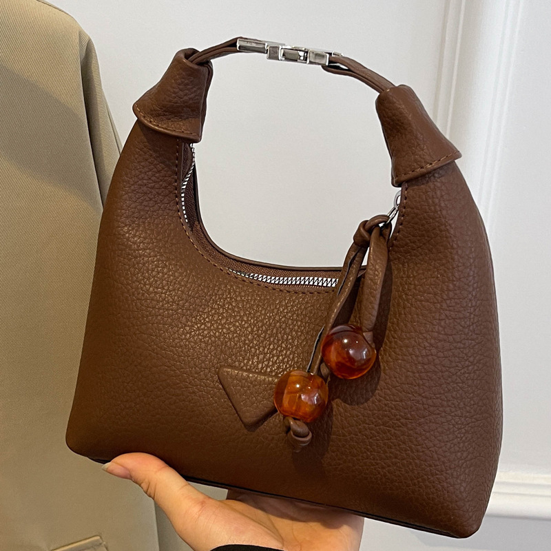 2025S Designer Women S Bag Simple Handheld Small For Women New Trendy Versatile Daily Matching Crossbody Solid Color Korean Dumpling Bag