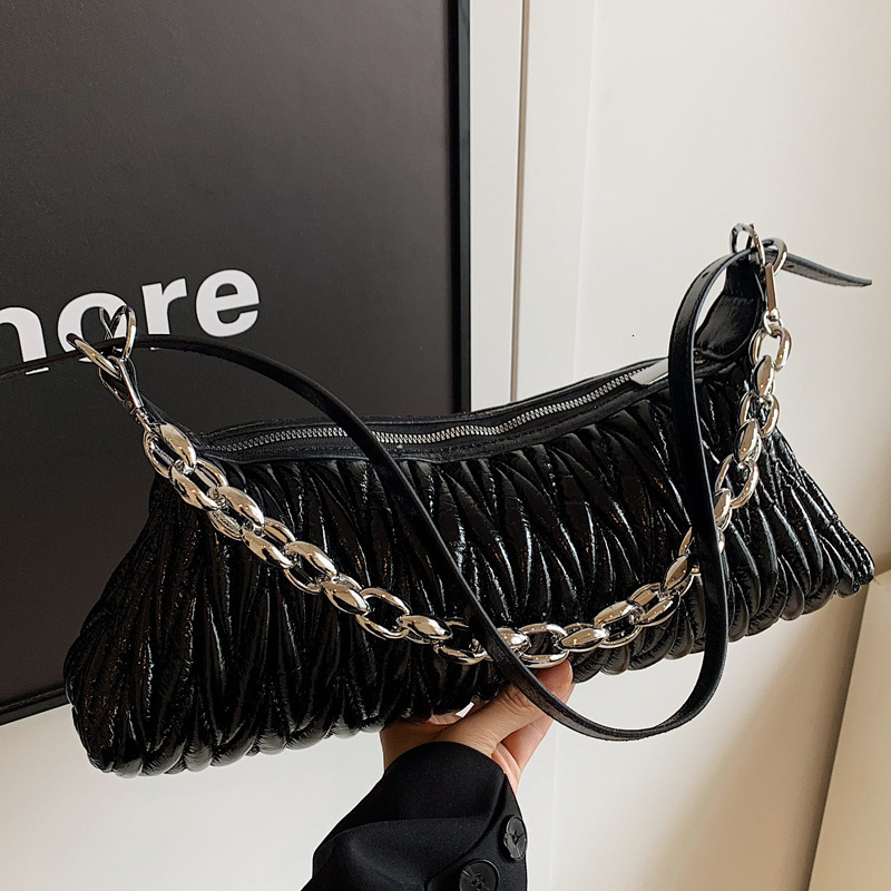 2025S Designer Women S Bag Single Shoulder Solid Color Casual Women S New Autumn Winter Armpit Bag Fashionable And Trendy Crossbody Bag