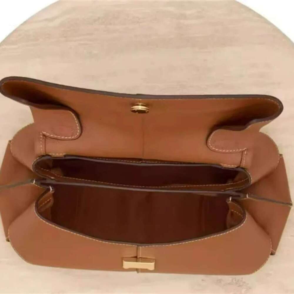 2025 Hot Fashionable Mokki Brand Smile Women's Bag French Design New Pole Head Cowhide Fashion Pleated Handbag