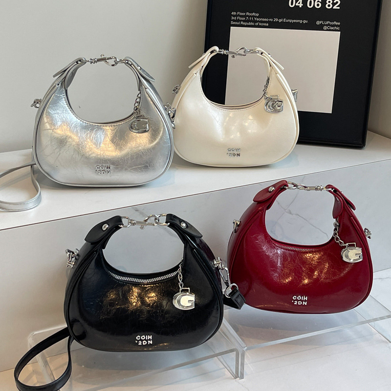 2025S Designer Women S Bag Small Silver Crescent Shaped With Niche Design New Korean Fashion Handbag Casual Versatile Shoulder Crossbody Bag