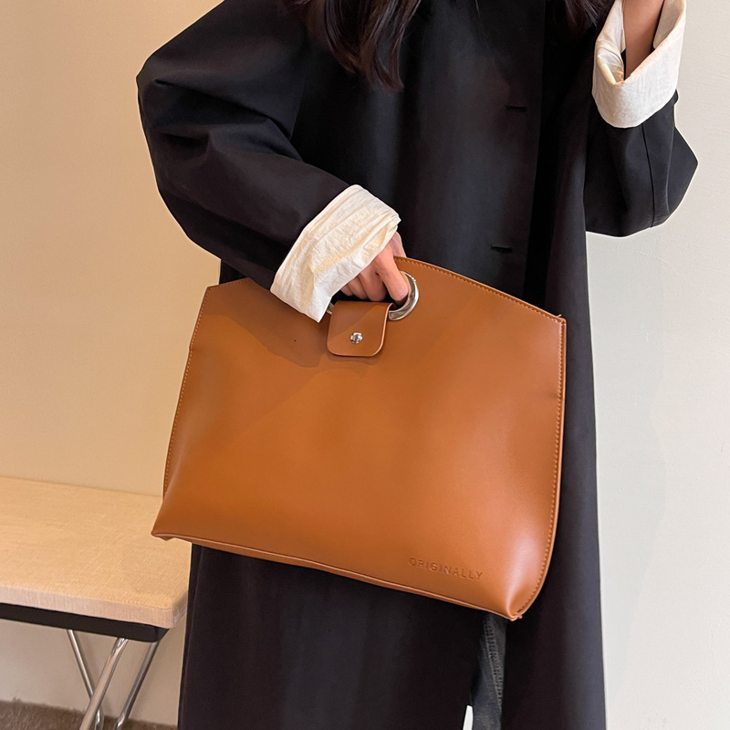 2025S Designer Women S Bag Large Capacity Bag Women S Spring Versatile New Handbag Simple And Casual Commuting Handbag For Class