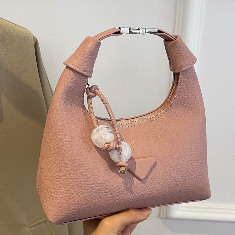 2025S Designer Women S Bag Simple Handheld Small For Women New Trendy Versatile Daily Matching Crossbody Solid Color Korean Dumpling Bag