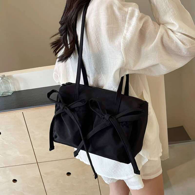 2025 New Korean Bow Nylon Shoulder Fashionable And Sweet Design Tote Bag Folded Large Capacity Commuter Women's Handbag