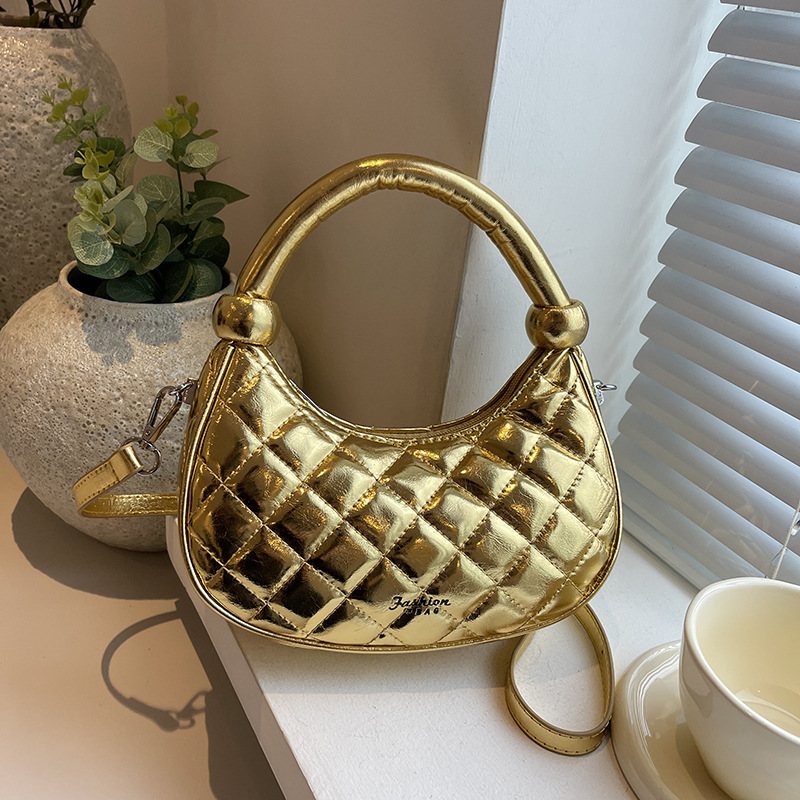 2025S Designer Women S Bag Premium Handbag Niche Silver Glossy Crescent Shaped Small Bag New Korean Version Fashionable Single Shoulder Crossbody Bag