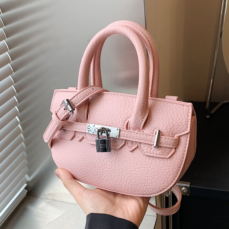 2025S Designer Women S Bag Handheld Kelly Women S Summer Versatile Light Luxury Commuting Oval Shoulder Bag High End Buckle Women Bags