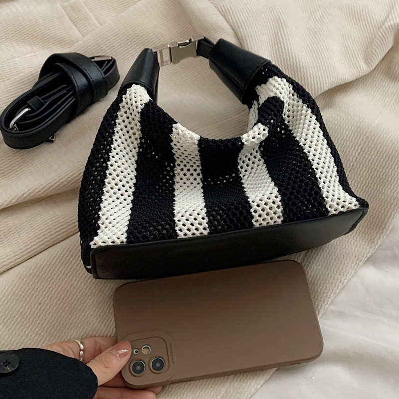 2025S Designer Women S Bag Summer Bucket Bag High End Exquisite Women S New Black And White Striped Hand Held Armpit Bag