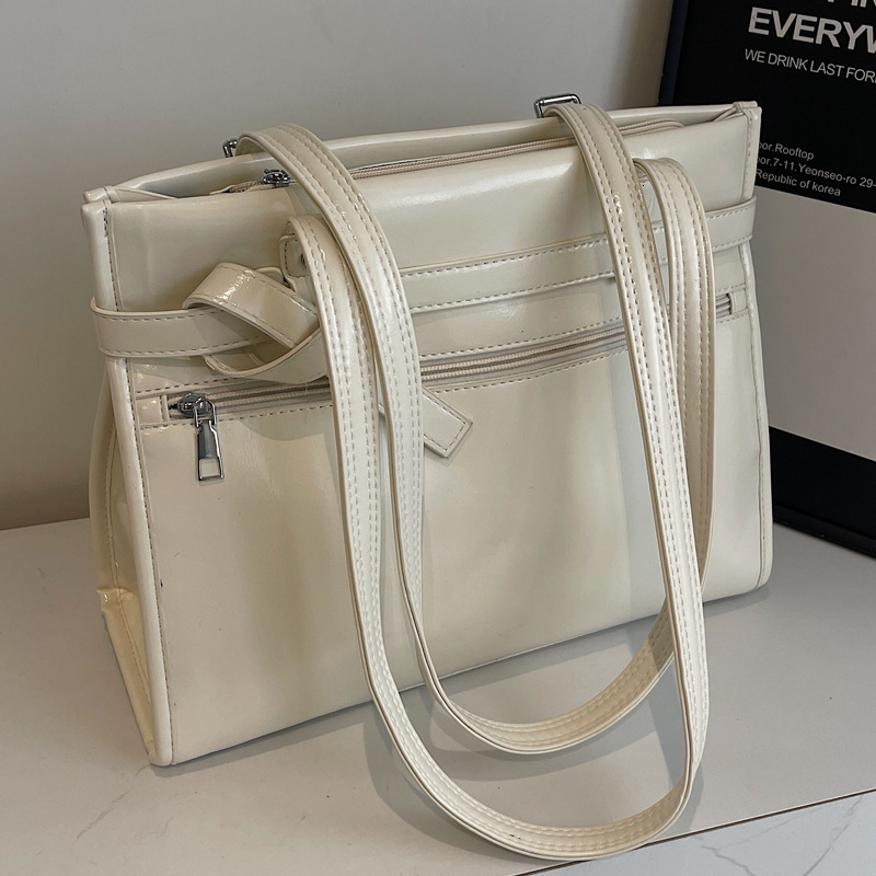 2025S Designer Women S Bag Niche High End Shoulder For Women New Fashion Versatile Simple Large Capacity Commuting Solid Color Tote Bag