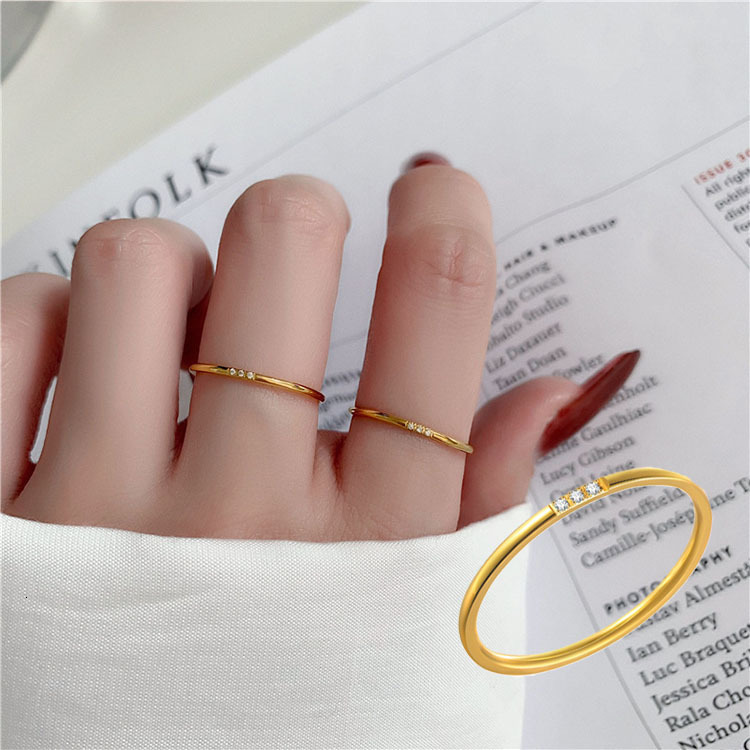 Top Source New Fashionable Light Luxury Cold Wind Titanium Steel Women's Round Thread Plain Circle One Diamond Ring Finger Plated Gold