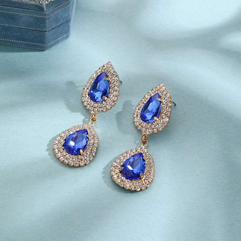 Water shaped welded hot ear pins, copper claw chains, earrings, daytime running water droplet glass earrings