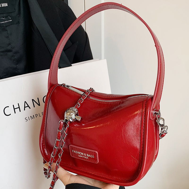 2025S Designer Women S Bag Handheld Women S New Urban Minimalist Crossbody Bag Single Shoulder Casual Commuting Texture Fashionable Small Square Bag