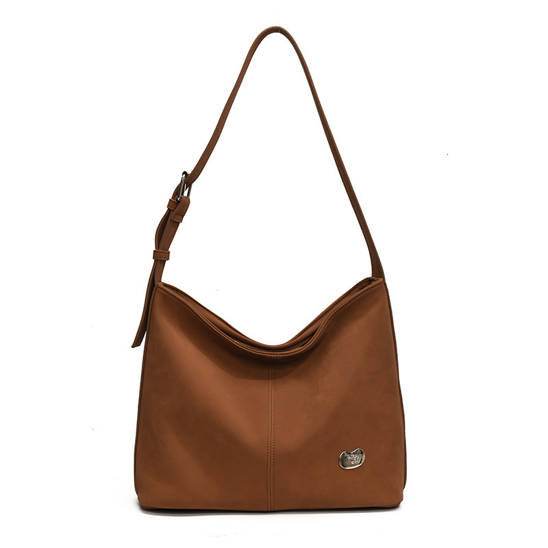 2025S Designer Women S Bag New Shoulder Niche Simple Solid Color Tote Versatile Commuting Lightweight Large Capacity Armpit Bag