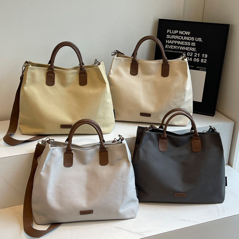 2025S Designer Women S Bag Korean Version Portable New Computer Business Commuting Large Capacity Crossbody City Simple Tote Women S Bag