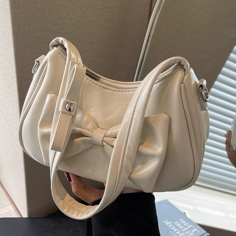 2025S Designer Women S Bag Texture Solid Color Bow Underarm Women S Summer New Item Niche Fashion Design Versatile Crossbody Shoulder Bag