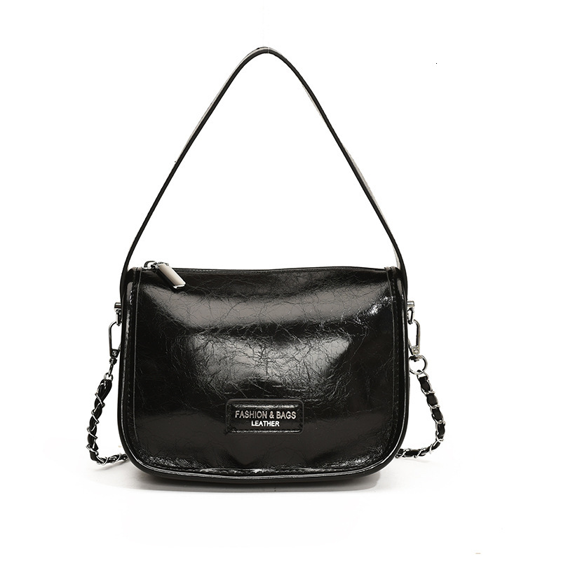 2025S Designer Women S Bag Handheld Women S New Urban Minimalist Crossbody Bag Single Shoulder Casual Commuting Texture Fashionable Small Square Bag