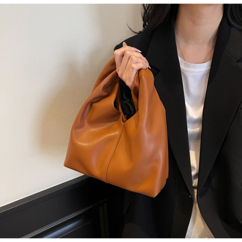 pleated fashionable solid color cloud bag simple and elegant soft leather handheld garbage bag 250402