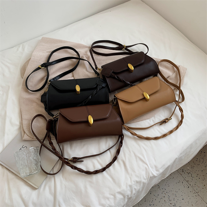 2025S Designer Women S Bag Uniquely Versatile Crossbody For Women Simple Hand Held Small Square Bag PU Texture Commuting Armpit Shoulder Bag