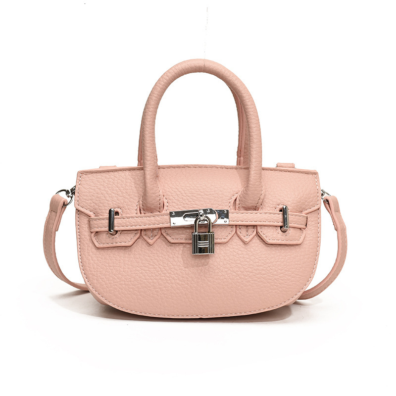 2025S Designer Women S Bag Handheld Kelly Women S Summer Versatile Light Luxury Commuting Oval Shoulder Bag High End Buckle Women Bags