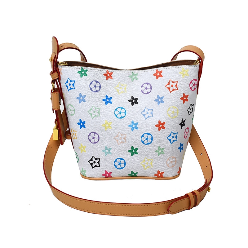 Design sense white tri-color multi-purpose bucket bag hand bag new niche large capacity hand crossbody shoulder bag 2025