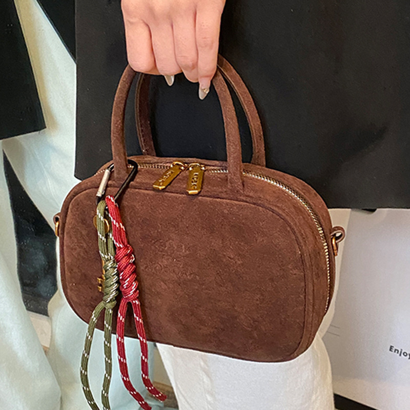 2025S Designer Women S Bag Matte High End Texture Handbag New Style Bowling Bag Temperament Crossbody Pillow Women S Bag