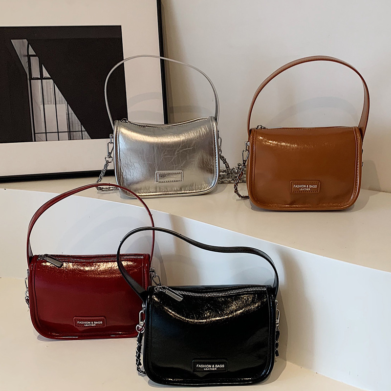 2025S Designer Women S Bag Handheld Women S New Urban Minimalist Crossbody Bag Single Shoulder Casual Commuting Texture Fashionable Small Square Bag