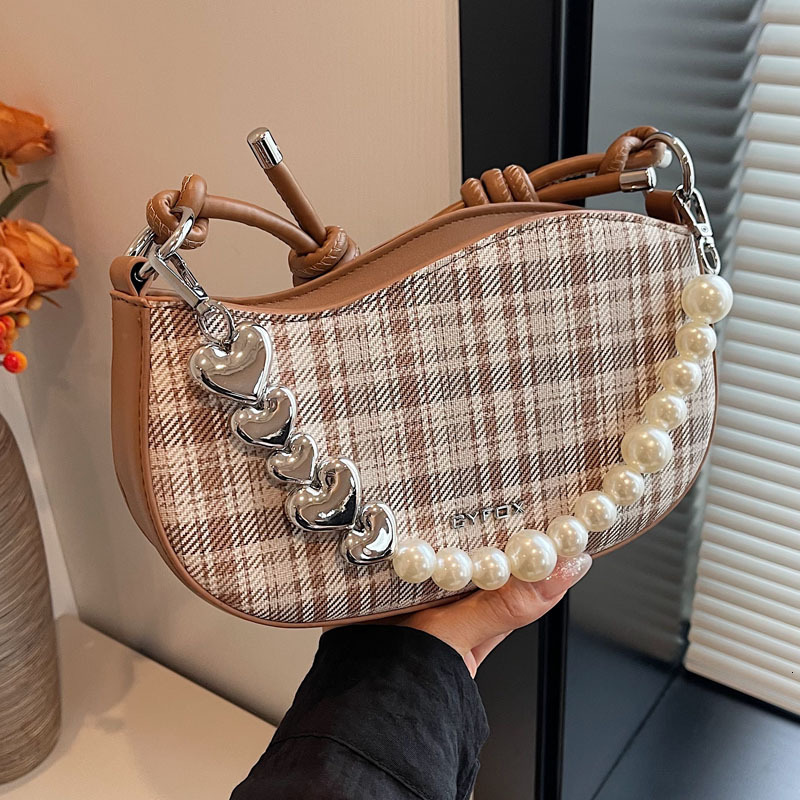 2025S Designer Women S Bag Fashionable Pearl Chain Armpit Bag New Niche Minimalist Handbag Stylish And Versatile Single Shoulder Crossbody Women S Bag