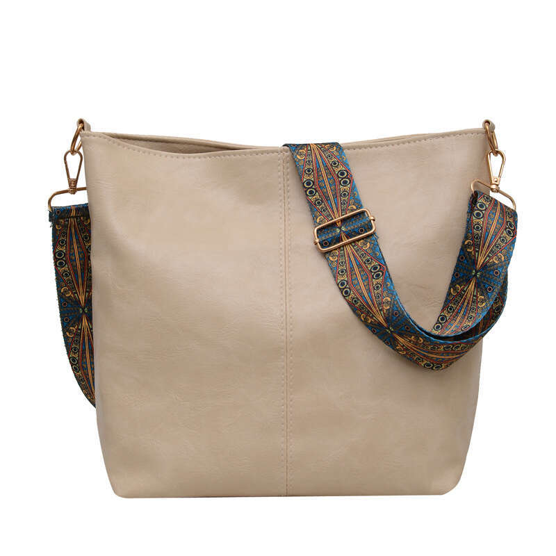 Designer's single shoulder handbag, large capacity soft leather women's commuting bucket diagonal cross bag, 2025 new casual fashion trend