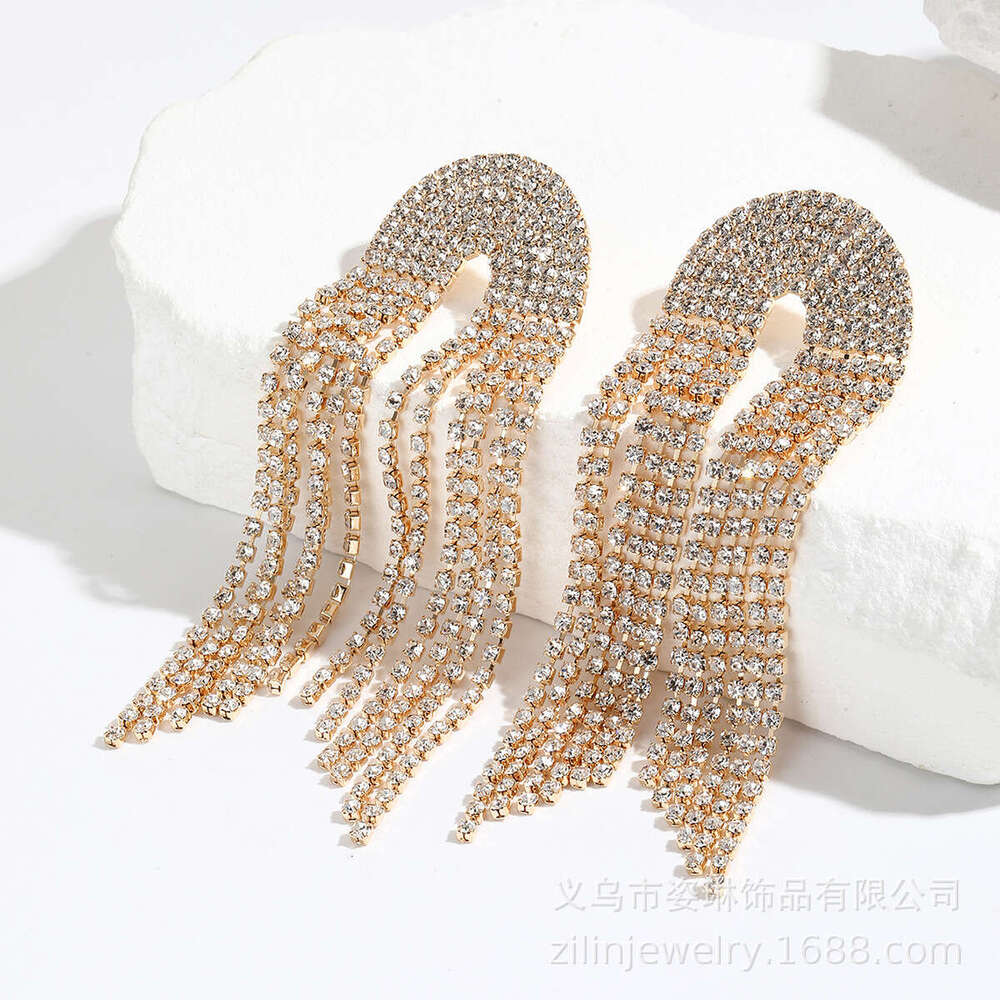 Hot selg with exaggerated high-end feel, light claw chain earrings, long rhie tassels, personalized girl earrings