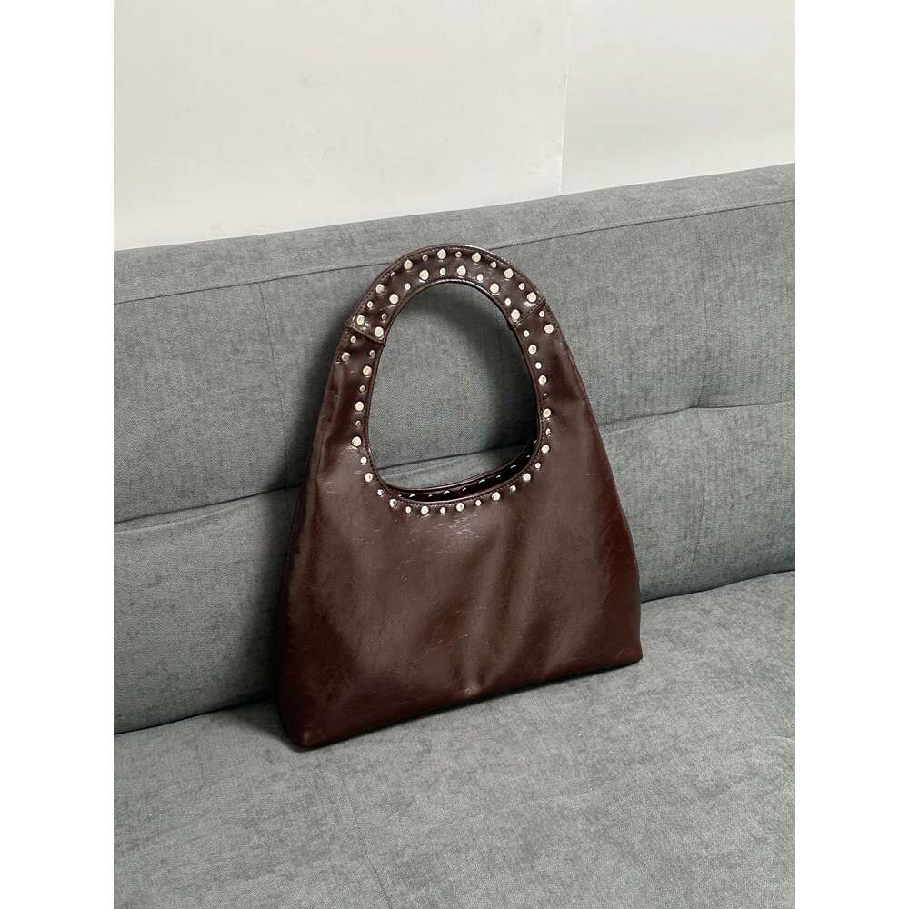 new retro 24 rivet decorative shoulder bag European and American motorcycle wind oil wax leather armpit handbag for women