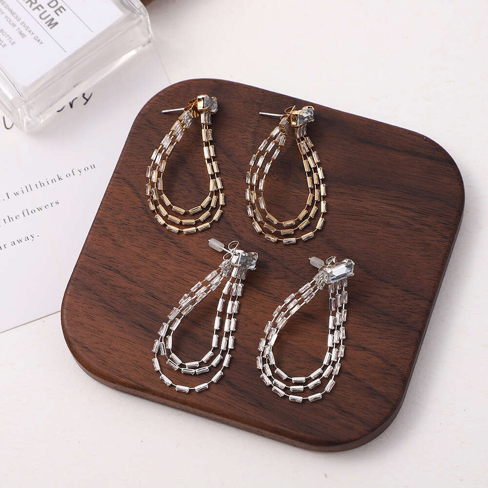 Korean style new water droplet simple dia studded earrings, personalized, hot fashionable and trendy, long chain women's earrings