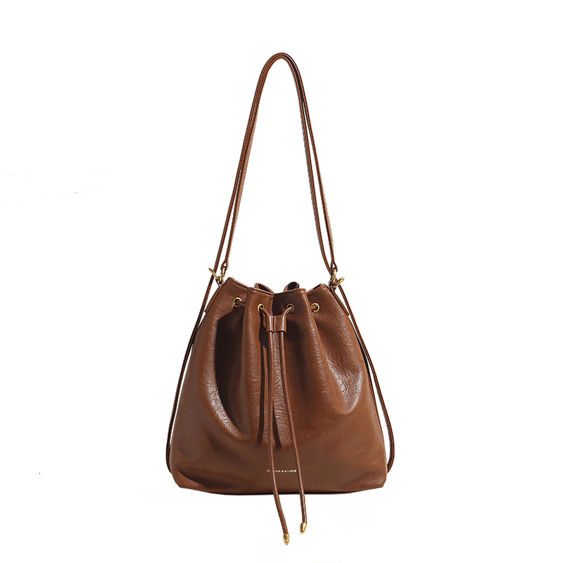 2025S Designer Women S Bag Korean Version Tote With High End Feel Large Capacity Bag For Women New Simple Bucket Bag Fashionable Backpack