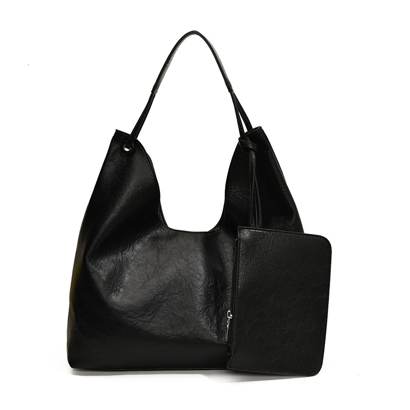 2025S Designer Women S Bag New Large Capacity Bucket Fashionable And Versatile Casual Commuting Tote Bag Niche Single Shoulder Armpit Bag