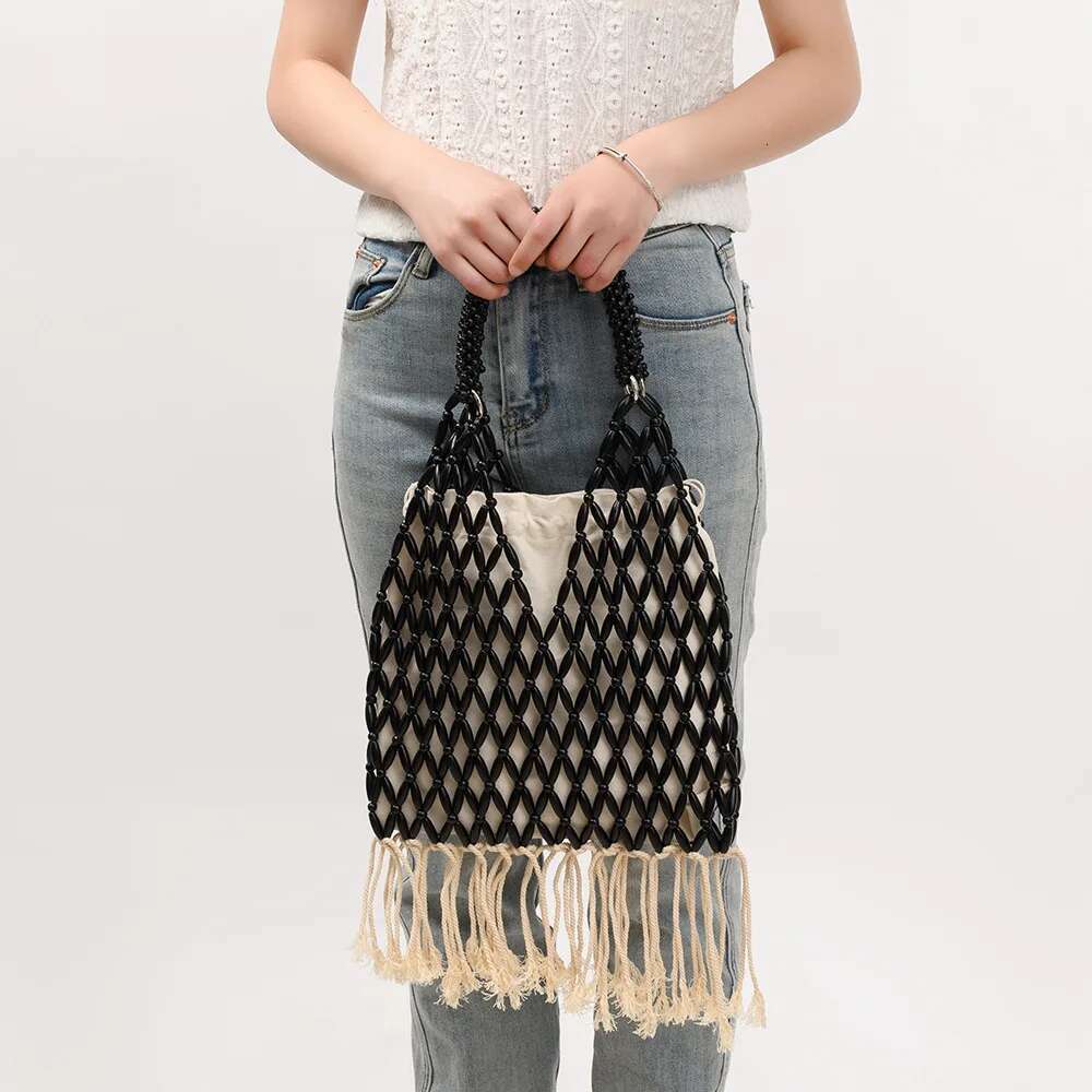 NEW Women Woven Tassels Design Hollow-Out Wooden Bead Tote Bucket Shoulder Bag Female Reticulate Netted Canvas Beach Handbag