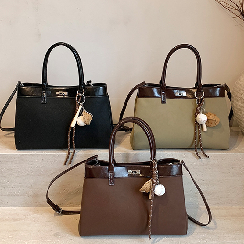 2025S Designer Women S Bag Simple Crossbody With Large Capacity New Autumn And Winter Bag Versatile Women S Hand Held Kelly Bag