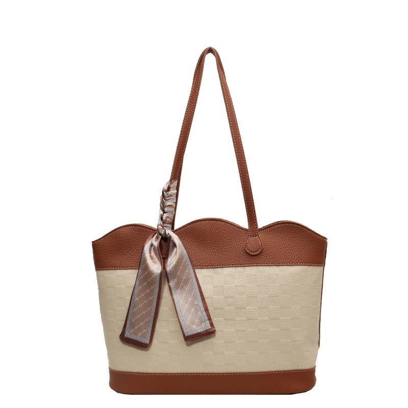 2025S Designer Women S Bag Handheld Tote For Women Large Capacity New Fashionable Women S Bag Simple And Versatile Commuting Shoulder Bag