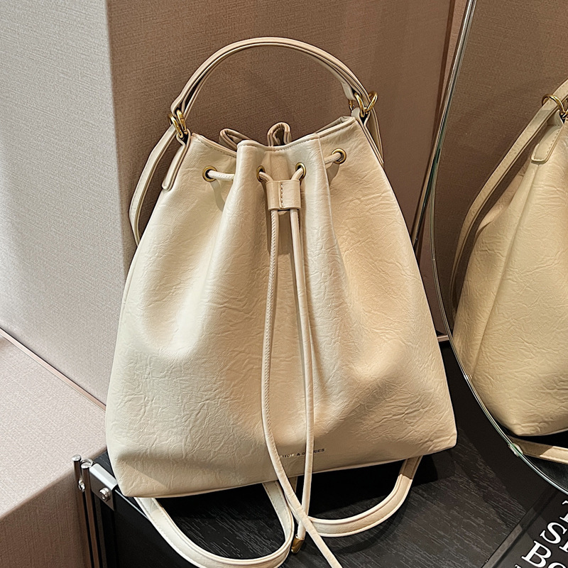 2025S Designer Women S Bag Korean Version Tote With High End Feel Large Capacity Bag For Women New Simple Bucket Bag Fashionable Backpack