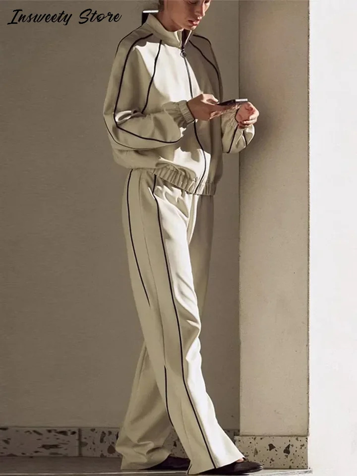 Striped sports jacket pants set womens loose full sleeved stand up collar top high waist wide leg pants spring womens track and field clothes 250402