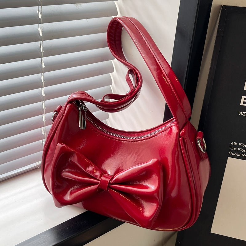 2025S Designer Women S Bag Texture Solid Color Bow Underarm Women S Summer New Item Niche Fashion Design Versatile Crossbody Shoulder Bag