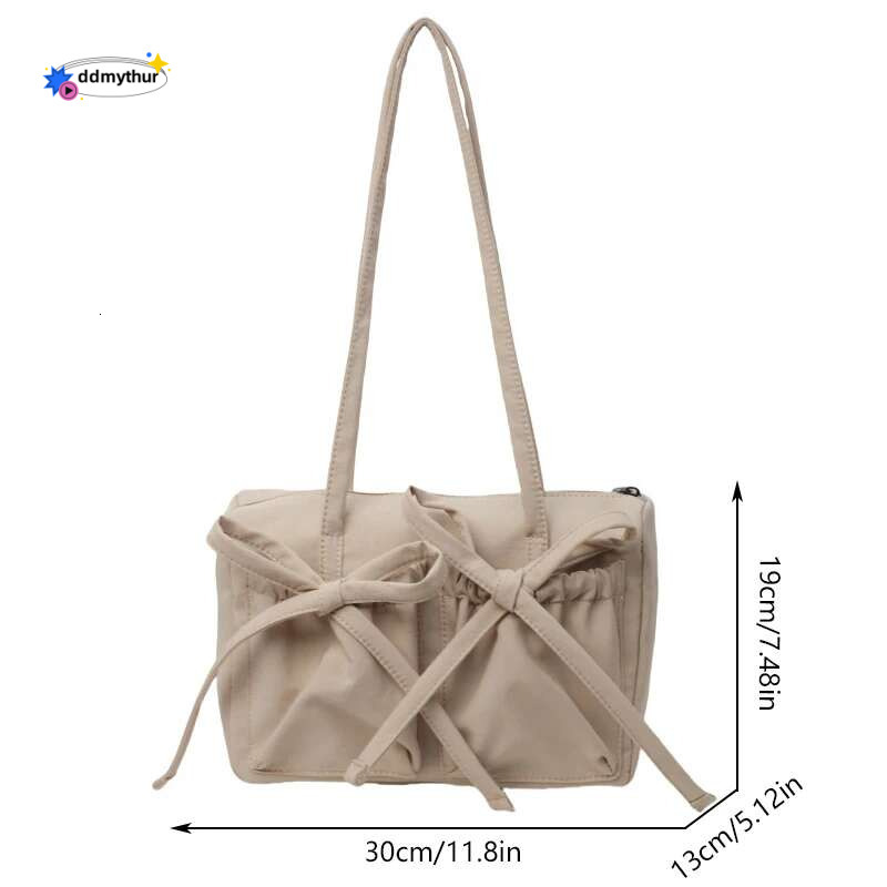 2025 New Korean Bow Nylon Shoulder Fashionable and Sweet Design Tote Bag Folded Large Capacity Commuter Women's Handbag ddmythur