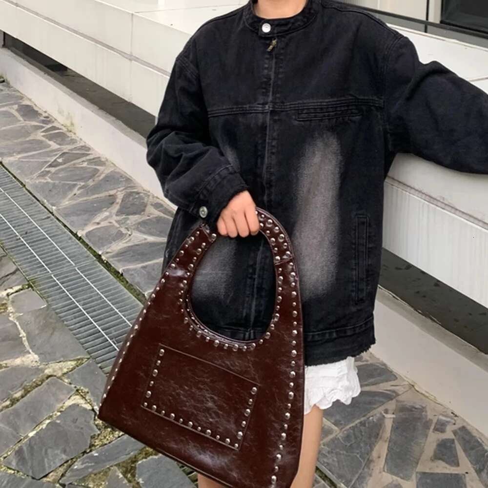 new retro 24 rivet decorative shoulder bag European and American motorcycle wind oil wax leather armpit handbag for women