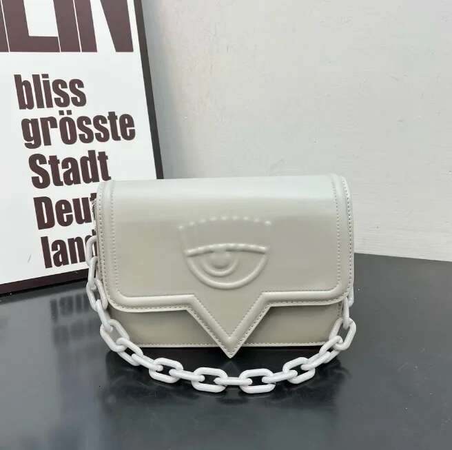 Brand Designer Women 2024 Hit Emed Eyes Chain Wide Strap Shoulder Fashion Trend Cute Exquisite Crossbody Bag